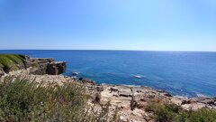 Ukryta goła plaża na skałach - Kalithea, Rodos
