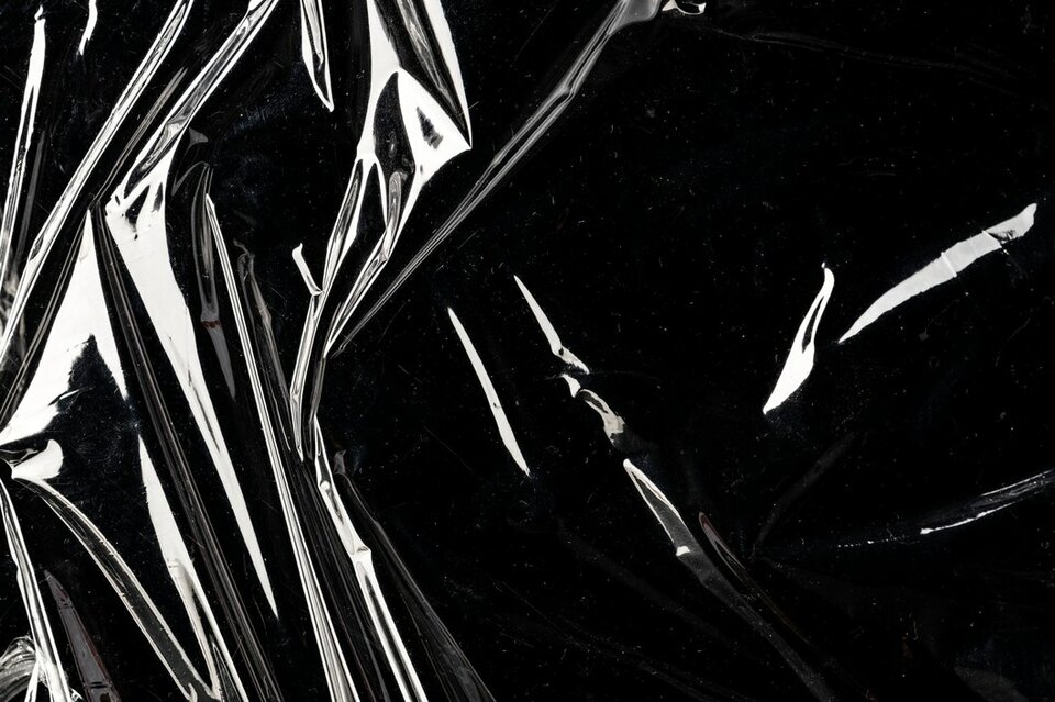 wrinkled-plastic-wrap-texture-on-a-black-background-wallpaper_53 - TheNeonDemon